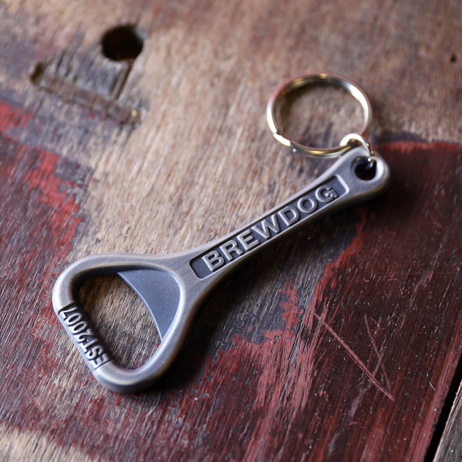 Bottle Opener Old-school bottle opener with an antique metal finish and a k...
